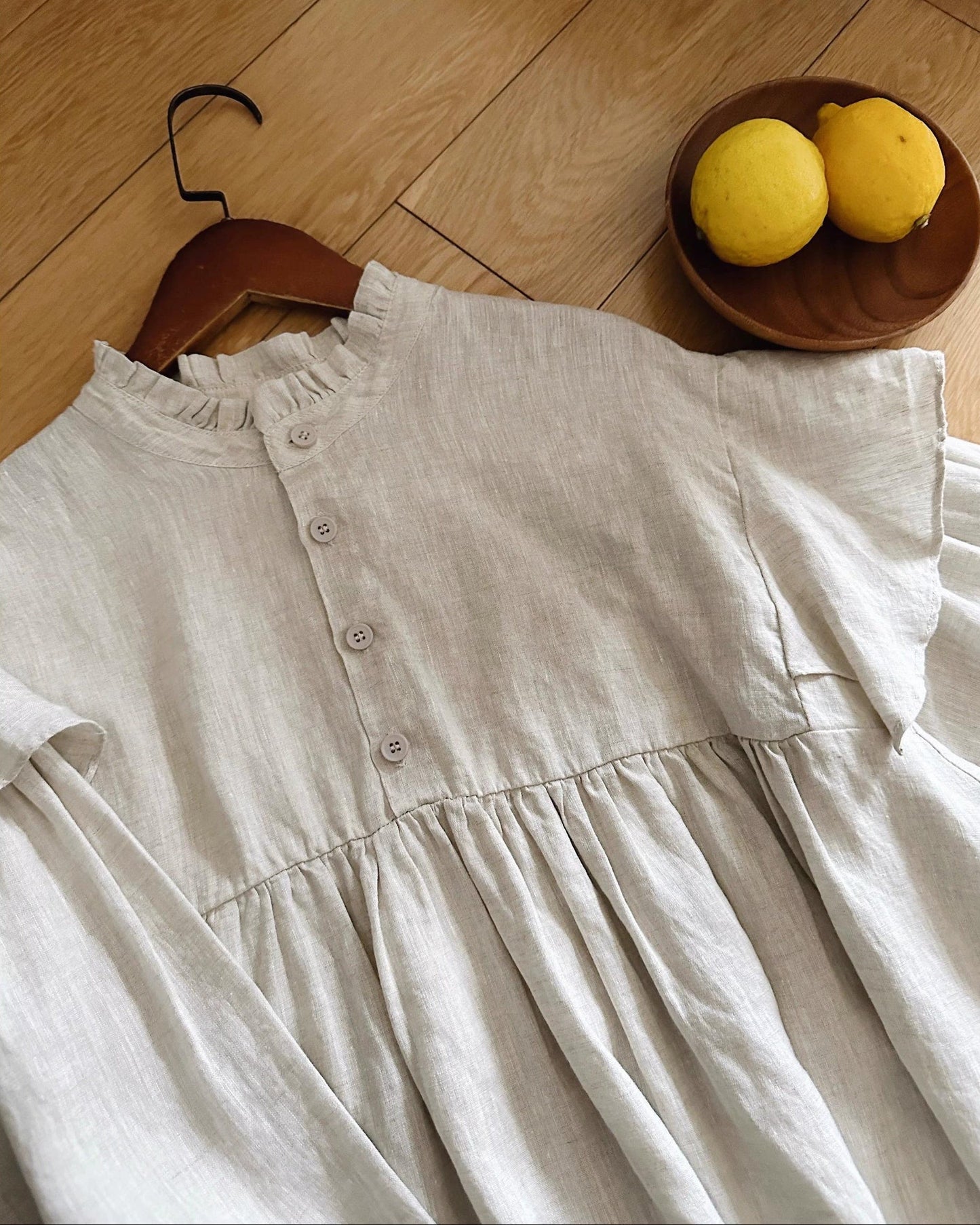 ハーフボタンフリルルミブラウス 10084